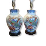 A PAIR OF MID 20TH CENTURY ORIENTAL PORCELAIN BIRDS OF PARADISE BALUSTER LAMP BASES Polychrome