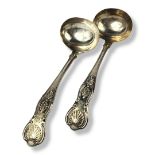 A PAIR OF VICTORIAN SILVER SAUCE LADLES Queens pattern, bearing engraved initials, hallmarked