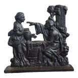AN EARLY 19TH CENTURY CAST IRON DOORSTOP CAST AS JESUS AND THE SAMARITAN WOMAN Conversing at
