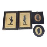 A PAIR OF 19TH CENTURY ENGLISH SILHOUETTES OF STANDING CHILDREN Together with another two 19th