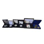 A COLLECTION OF EIGHT 1OZ SILVER PROOF COINS Comprising an Isle of Man three coin set, a silver