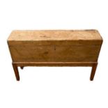 A 19TH CENTURY PINE BOX ON LATER STAND. (88cm x 25cm x 50cm) Condition: good, worn