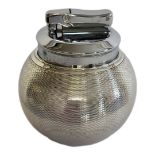 A VINTAGE SILVER SPHERICAL TABLE LIGHTER With textured design, marked to base 'Witchball by