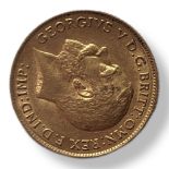 AN EARLY 20TH CENTURY 22CT GOLD HALF SOVEREIGN COIN, DATED 1912 With George and Dragon design to