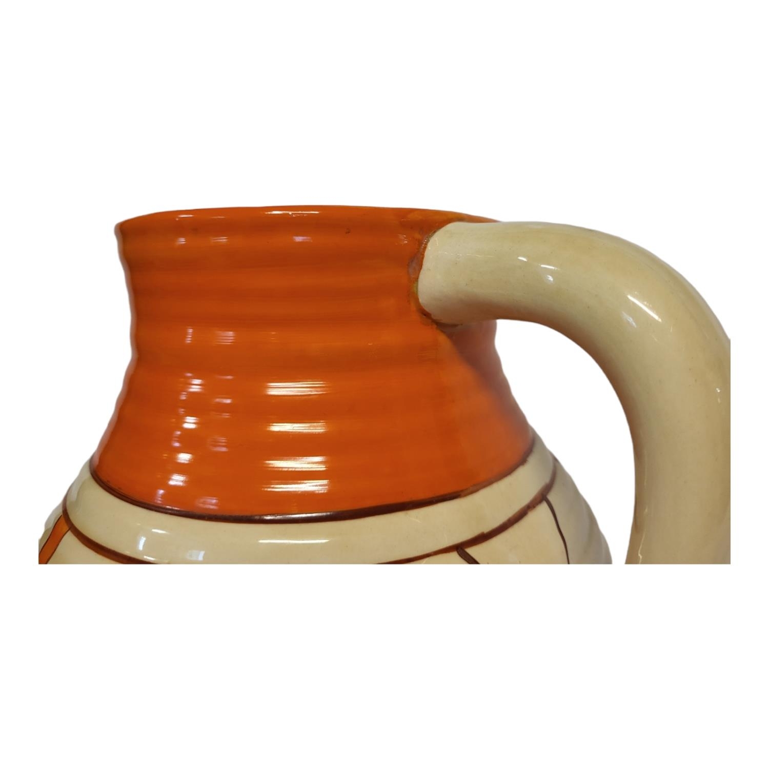 CLARICE CLIFF, FANTASQUE BIZARRE RANGE, AN ART DECO SINGLE HANDLED LOTUS JUG The ribbed tapering - Image 9 of 13