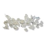A VINTAGE SWAROVSKI CRYSTAL PENGUIN Together with other crystal ornaments to include an owl, a frog,