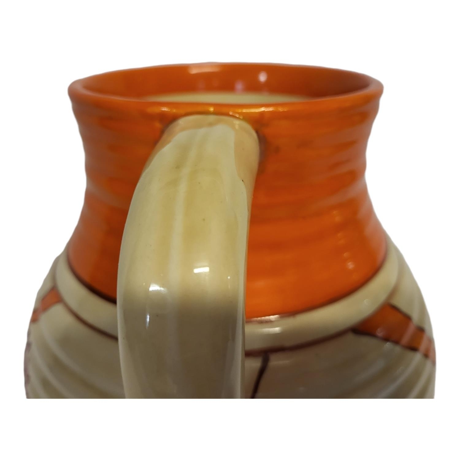 CLARICE CLIFF, FANTASQUE BIZARRE RANGE, AN ART DECO SINGLE HANDLED LOTUS JUG The ribbed tapering - Image 6 of 13
