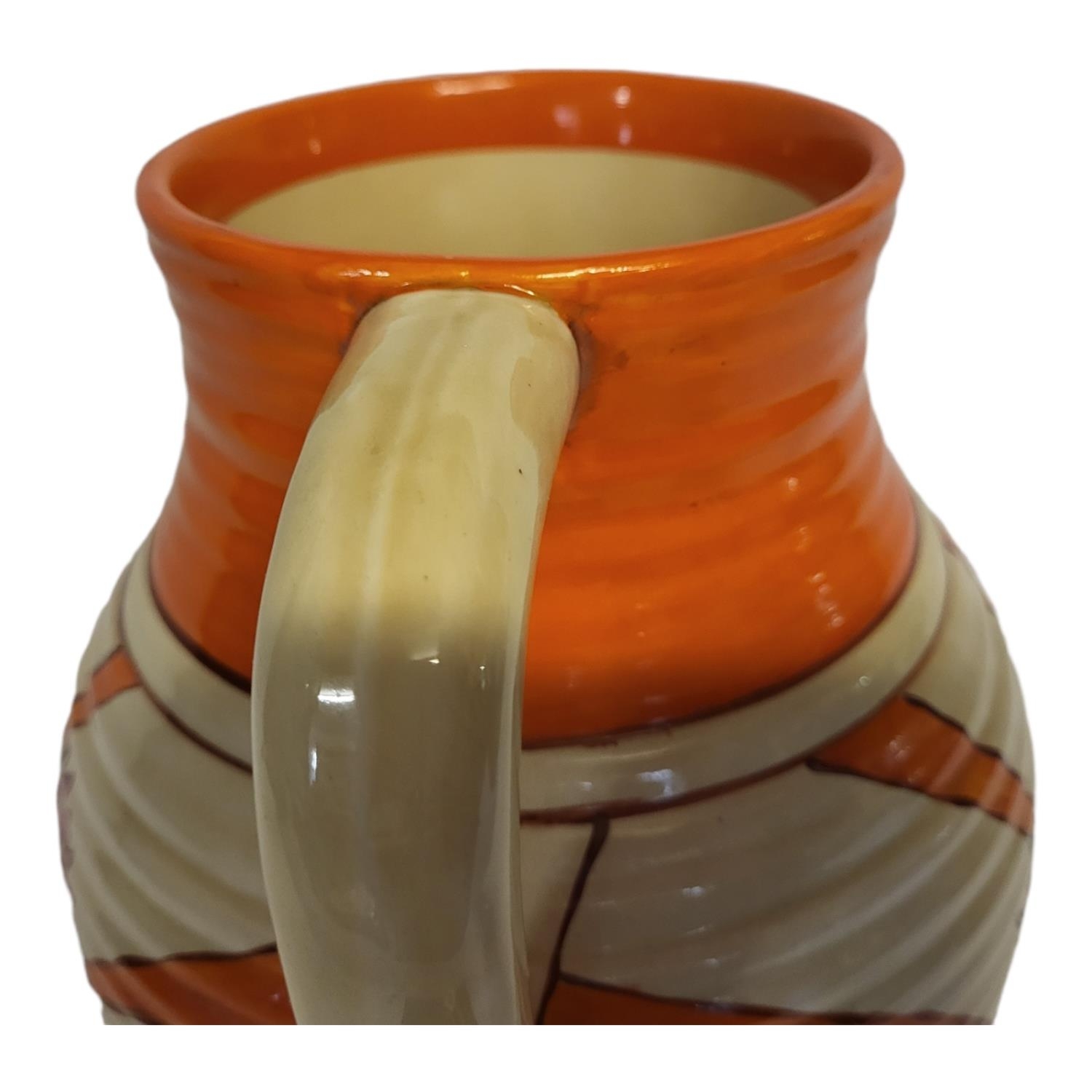 CLARICE CLIFF, FANTASQUE BIZARRE RANGE, AN ART DECO SINGLE HANDLED LOTUS JUG The ribbed tapering - Image 7 of 13