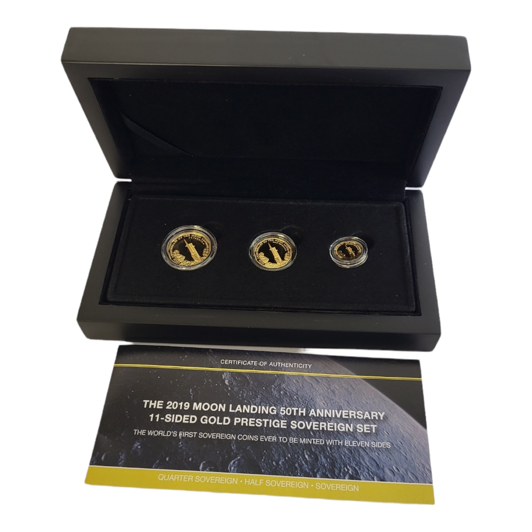 A 22CT GOLD 'MOON LANDING' COMMEMORATIVE PRESTIGE PROOF SOVEREIGN SET, ISSUED 2019 Comprising