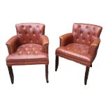 A PAIR OF TAN FAUX LEATHER BUTTON BACK SALON CHAIRS On square tapering legs. (64cm x 60cm x 83cm)