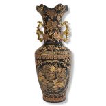A 20TH CENTURY CONTINENTAL CHINESE INSPIRED DECORATED SEMI LUSTRE PORCELAIN JEWELLED TWIN HANDLED