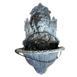 A LEAD WALL MOUNTING FONT Cast with a lion mask above trough with pump. (50cm x 70cm) Condition: