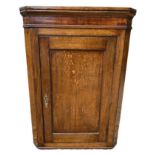 AN 18TH CENTURY OAK WALL HANGING CORNER CUPBOARD. (74cm x 40cm x 102cm) Condition: good overall