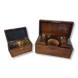 A VICTORIAN IRISH MAHOGANY CASED RECTANGULAR TEA CADDY Two section hinged canisters, fitted interior