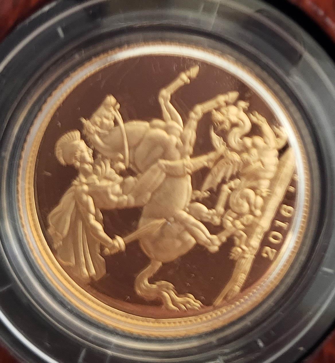 A 22CT GOLD FULL SOVEREIGN PROOF COIN, DATED 2016 With George and Dragon to reverse, in a protective - Image 3 of 5