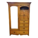 A 19TH CENTURY ASH COMPACTUM WARDROBE With dentil cornice spindled galleried kennel above