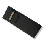 A VINTAGE 9CT GOLD AND BLACK LEATHER RECTANGULAR WALLET With textured gold corner mounts, together