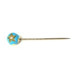 A LATE 19TH CENTURY YELLOW METAL ROUND SEED PEARL STICK PIN The round head decorated with blue