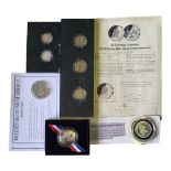 A COLLECTION OF AMERICAN SILVER AND CUPRONICKEL COMMEMORATIVE COINS Comprising a silver Liberty Half