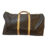 LOUIS VUITTON, A KEEPALL 55 TRAVEL BAG Complete with dust bag, double leather handle, leather ID