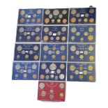 A COLLECTION OF TWELVE MID 20TH CENTURY COMMEMORATIVE CUPRONICKEL PROOF COIN SETS Comprising a