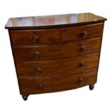 AN EARLY 19TH CENTURY MAHOGANY BOW FRONTED CHEST Of two short above three long drawers. (111cm x