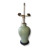 A LATE 19TH/EARLY 20TH CENTURY CHINESE CELADON GLAZED BALUSTER TABLE LAMP BASE Moulded with floral