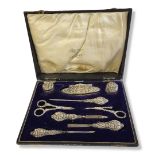 AN EARLY 20TH CENTURY SILVER MANICURE SET IN ORIGINAL CASE Hallmarked Chester, 1911, on all but