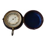 A 19TH CENTURY GILT BRASS SPHERICAL POCKET BAROMETER The silvered dial marked ‘C. Johnson and
