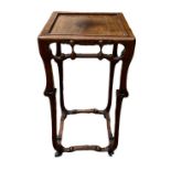 AN EARLY 20TH CENTURY CHINESE HARDWOOD SIDE TABLE The square top above a pierced gallery, on