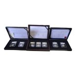 A COLLECTION OF THREE COMMEMORATIVE CUPRO NICKEL FIFTY PENCE COIN SETS Two Datestamp Editions 'UK