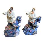 A PAIR OF 20TH CENTURY RUSSIAN SOVIET EXPORT WARE PORCELAIN MUSICIAN FIGURES Polychrome painted in