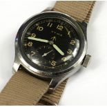 CYMA, DIRTY DOZEN, A VINTAGE BRITISH MILITARY ISSUE STAINLESS STEEL GENT’S WRISTWATCH Circular black