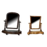 A LATE VICTORIAN BURR WALNUT SWING DRESSING TABLE/TOILET MIRROR Raised on columns on four bun