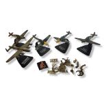A COLLECTION OF BRASS MILITARY CAP BADGES To include a Queen Elizabeth II Cunard tin, 15 in total,