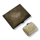 A VINTAGE SILVER RECTANGULAR CIGARETTE CASE With engine turned decoration and gilt interior,