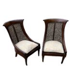 A PAIR OF WILLIAM IV MAHOGANY BERGERE CHILDREN’S CHAIRS With caned swept backs and seats and