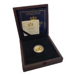 A 22CT GOLD SAPPHIRE JUBILEE ONE POUND PROOF COIN, DATED 2017 With Queen Elizabeth II portrait and