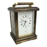 A LATE 19TH/EARLY 20TH CENTURY CASED GILDED BRASS CARRIAGE CLOCK/TIMEPIECE The white enamel dial