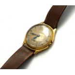 OMEGA, A VINTAGE 18CT GOLD GENT’S WRISTWATCH Circular silver tone dial and subsidiary seconds