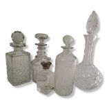 AN EDWARDIAN CYLINDRICAL GLASS DECANTER AND STOPPER Engraved within cartouche of fruiting vines,