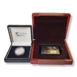 TWO SILVER 'MOON LANDINGS COMMEMORATIVE’ COINS A high relief piedfort 2oz coin and a silver gilt bar