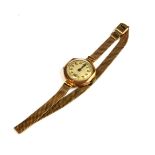 AN EARLY 20TH CENTURY LADIES’ 9CT GOLD WRISTWATCH The hexagonal gold case with Arabic numbers to