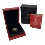 A 22CT GOLD 'EAST INDIA COMPANY' MILITARY GUINEA PROOF COIN, DATED 2020 With St. Helena coin