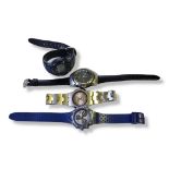 A COLLECTION OF VINTAGE GENTS FASHION WRISTWATCHES Comprising a Swatch watch with blue rubber