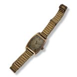 AN ART DECO 9CT GOLD GENT’S WRISTWATCH Lozenge form, silver tone dial, Arabic number markings and