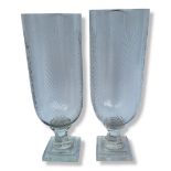 A PAIR OF CUT GLASS HURRICANE/STORM LAMPS Decorated with engraved ferns, a thick stem over stepped
