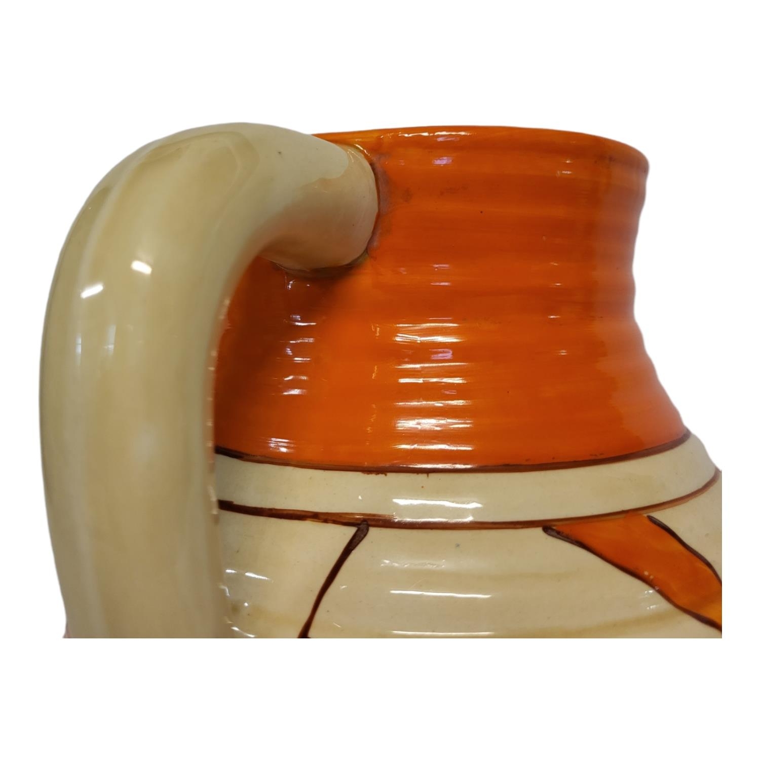 CLARICE CLIFF, FANTASQUE BIZARRE RANGE, AN ART DECO SINGLE HANDLED LOTUS JUG The ribbed tapering - Image 8 of 13