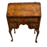 A QUEEN ANNE STYLE WALNUT AND HERRING BONE INLAID LADIES’ WRITING BUREAU, CIRCA 1930 The fall