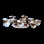 ROYAL ALBERT, A VINTAGE OLD COUNTRY ROSES PORCELAIN TEA SET Comprising a milk jug, sugar bowl,